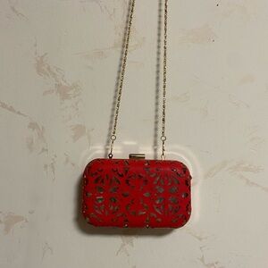 Chic Red Cutout Clutch with Gold Chain